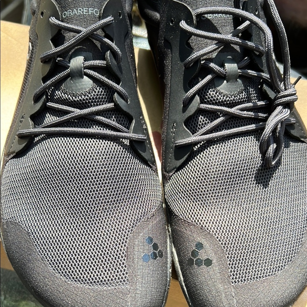 Brand new Vivo barefoot Black Athletic Shoes with Sleek Design